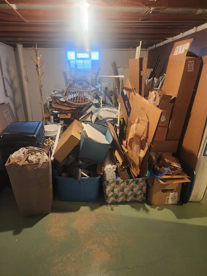 Roll-off dumpster container at job site for Construction Dumpster Rental in Fruitport